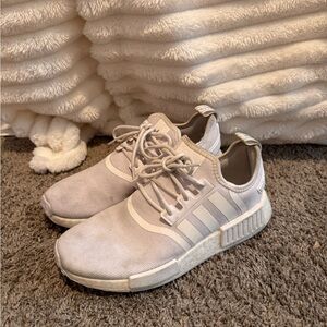 Woman’s white adidas nmd